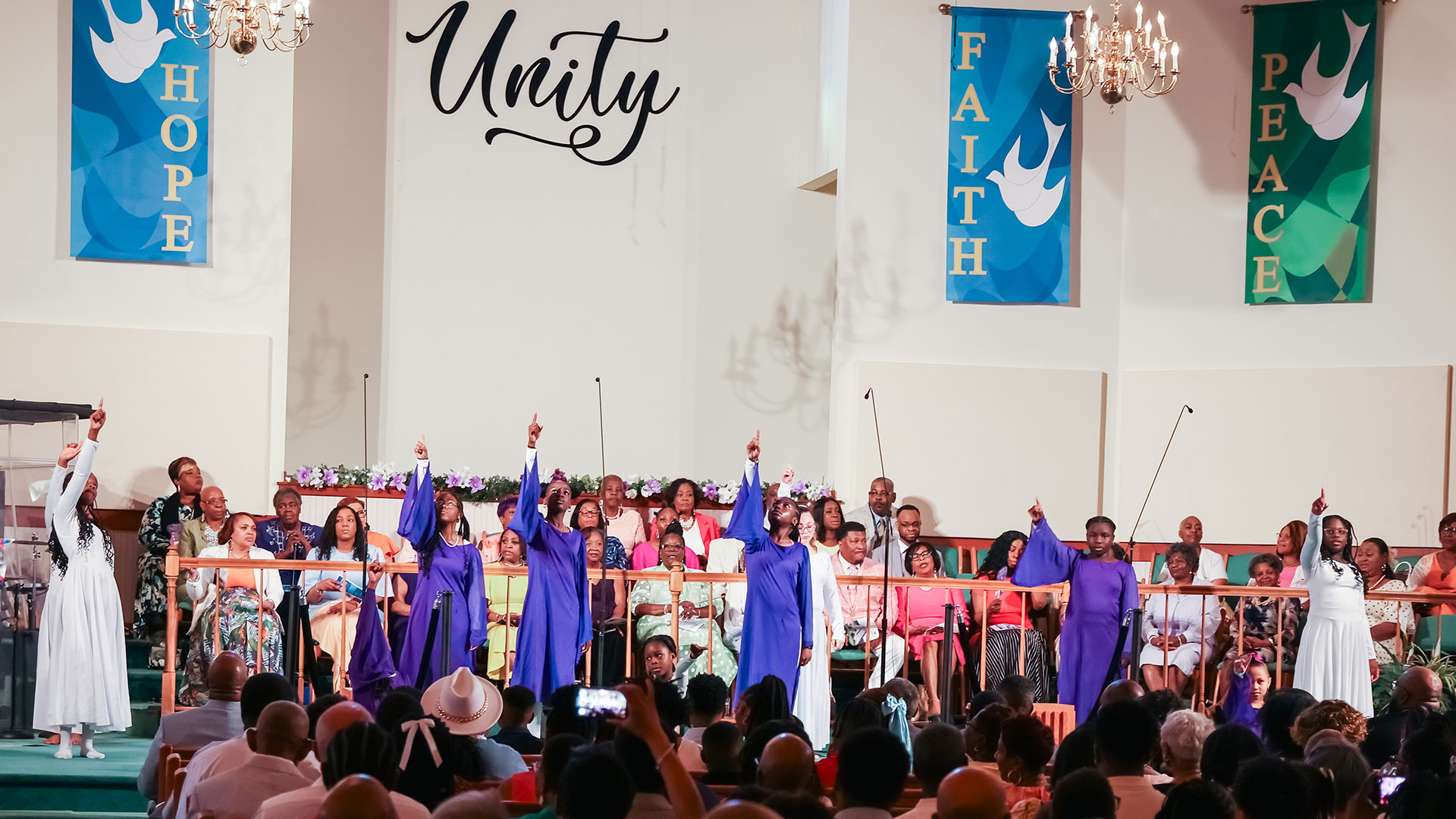 Youth praise dancers and adult choir
